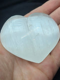 Natural Selenite Heart Palmstone - Engraved Om Symbol Crystal. P.S every stone is different the one in the photos is generally what they look like
