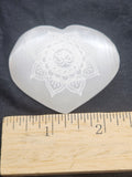 Natural Selenite Heart Palmstone - Engraved Om Symbol Crystal. P.S every stone is different the one in the photos is generally what they look like